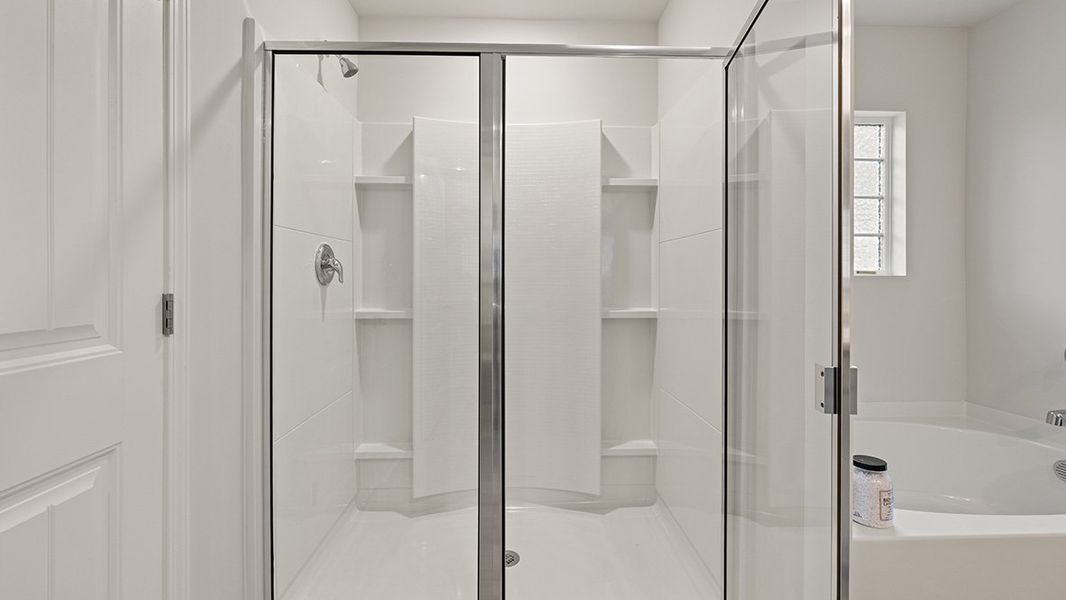 Representative furnished interior of a home built from the ROBIE by D.R. Horton in Pointe Park, Union City (Image 27).