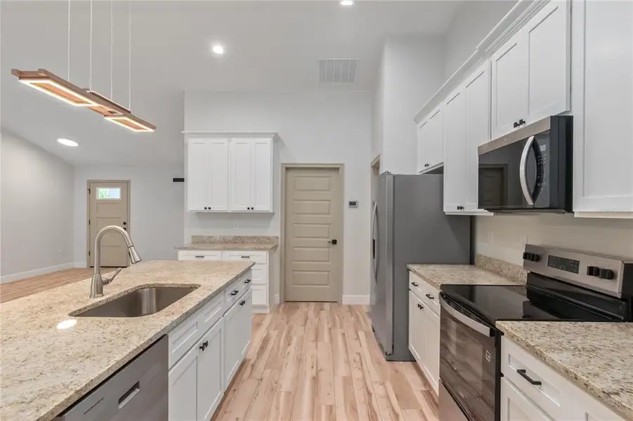 Furnished interior view inside a new home in , Ocala (Image 11).