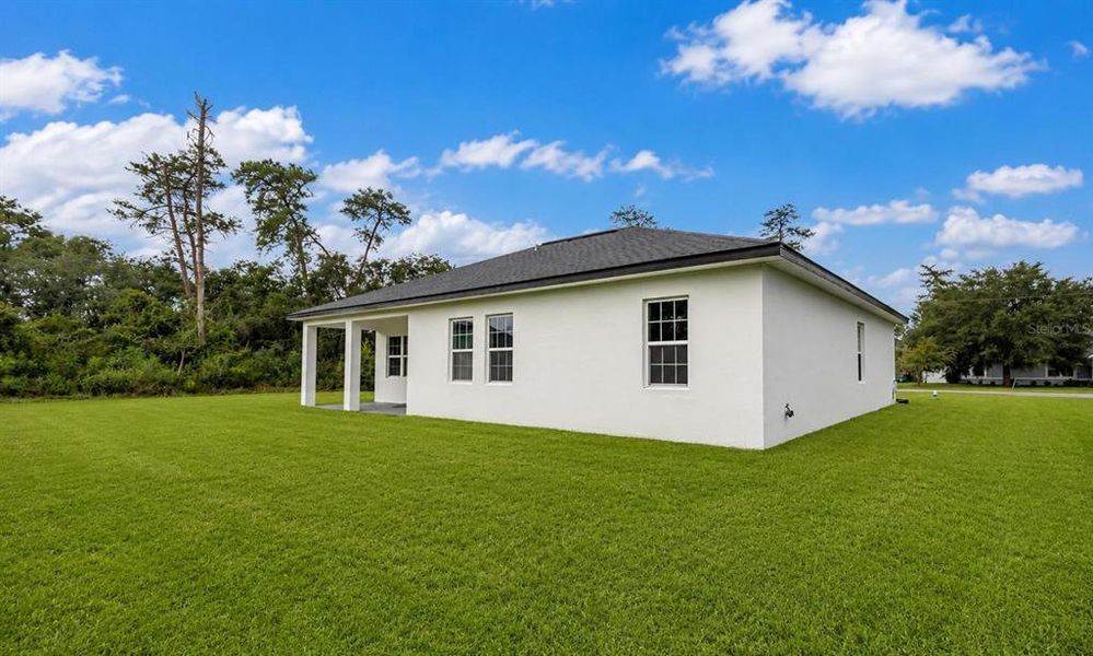 Exterior details and patio area of a home in , Ocala (Image 27).