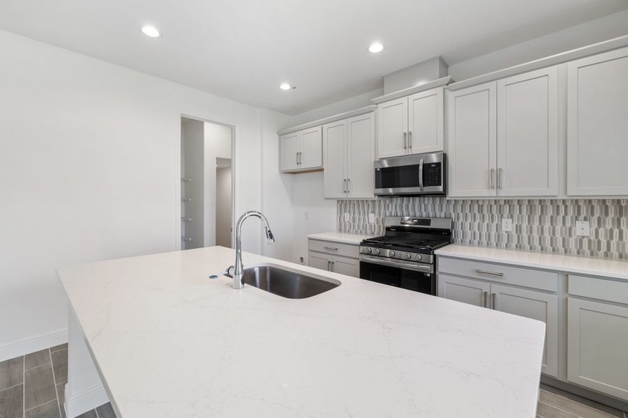 Representative furnished interior of a home built from the Newcastle by Risewell Homes in Park View at the Hills, Minneola (Image 5).