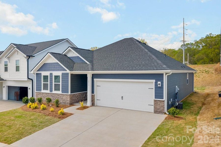 Front exterior of a new home in Sheffield, Indian Trail, NC, highlighting curb appeal (Image 21).