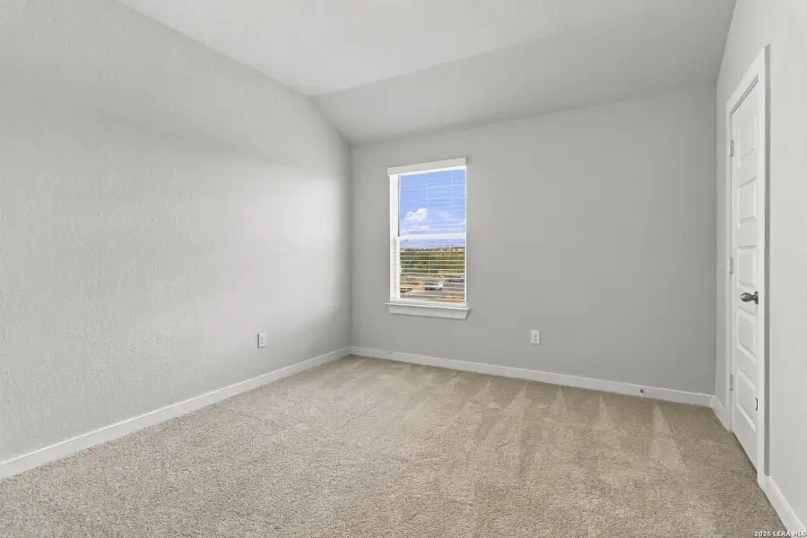 Spacious, unfurnished interior of a new home in Hunters Ranch, San Antonio (Image 22).