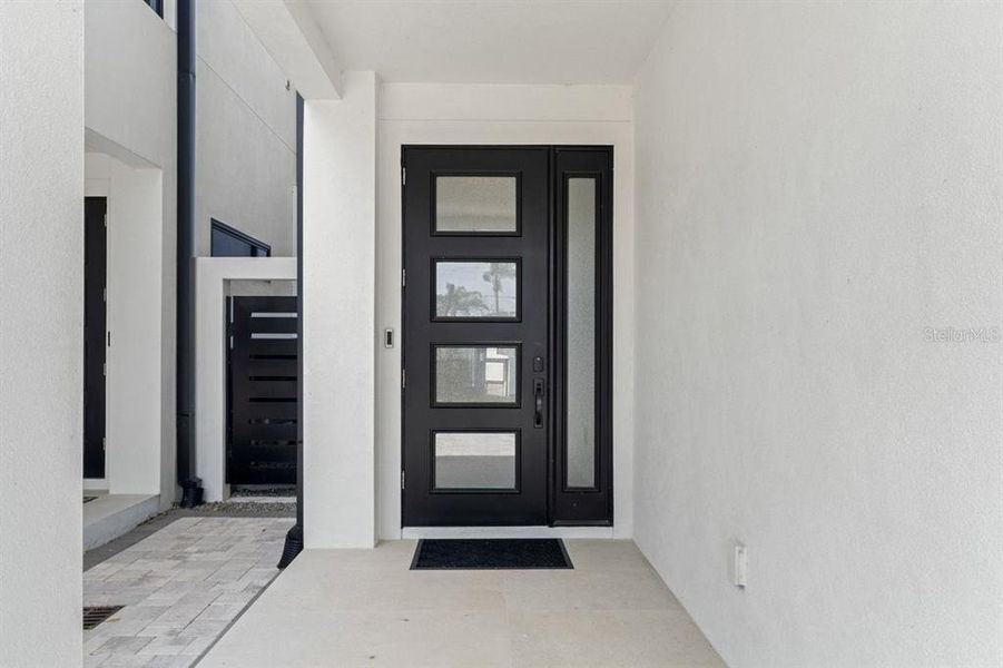Exterior details and patio area of a home in , New Smyrna Beach (Image 29).