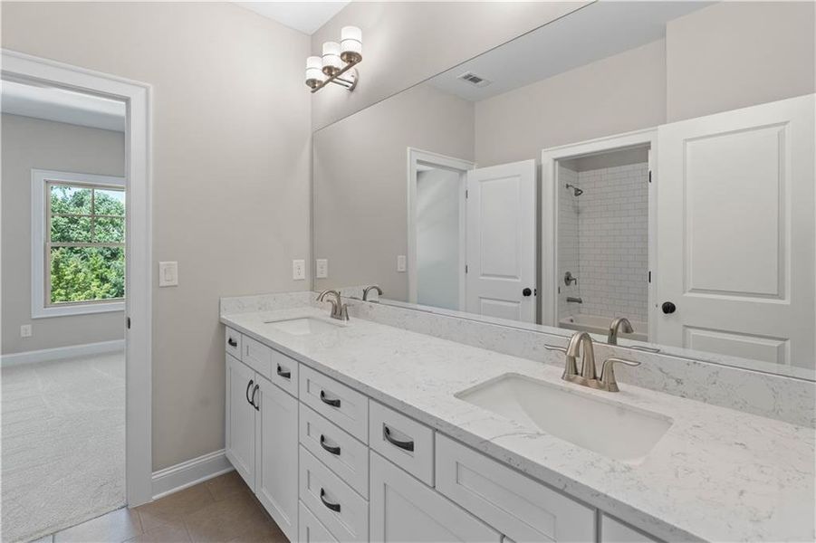 Furnished interior view inside a new home in Bellwyn, Johns Creek (Image 29).