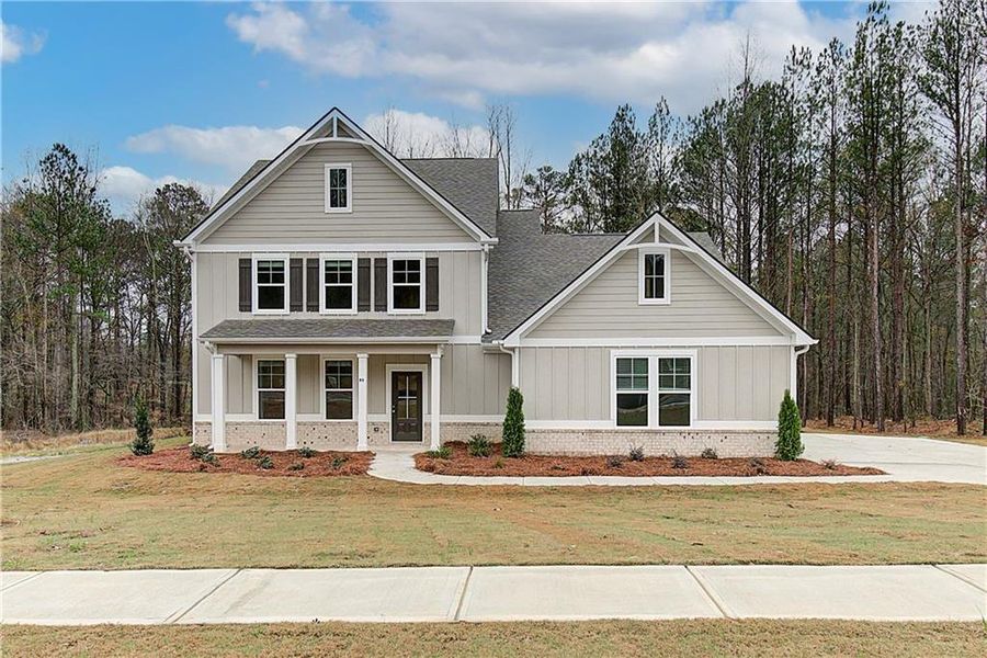 Front exterior of a new home in , Senoia, GA, highlighting curb appeal (Image 14).