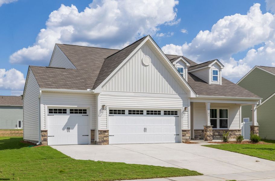 Front exterior of a new home in Benson Village, Benson, NC, highlighting curb appeal (Image 1). Front exterior of a new home in Benson Village, Benson, NC, highlighting curb appeal (Image 1).