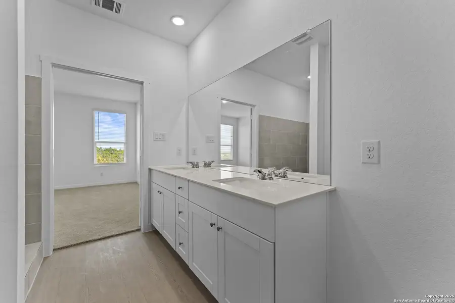 Furnished interior view inside a new home in Waterwheel: Coastline Collection, San Antonio (Image 7).