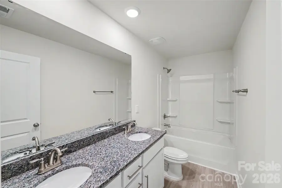 Furnished interior view inside a new home in , Iron Station (Image 6).