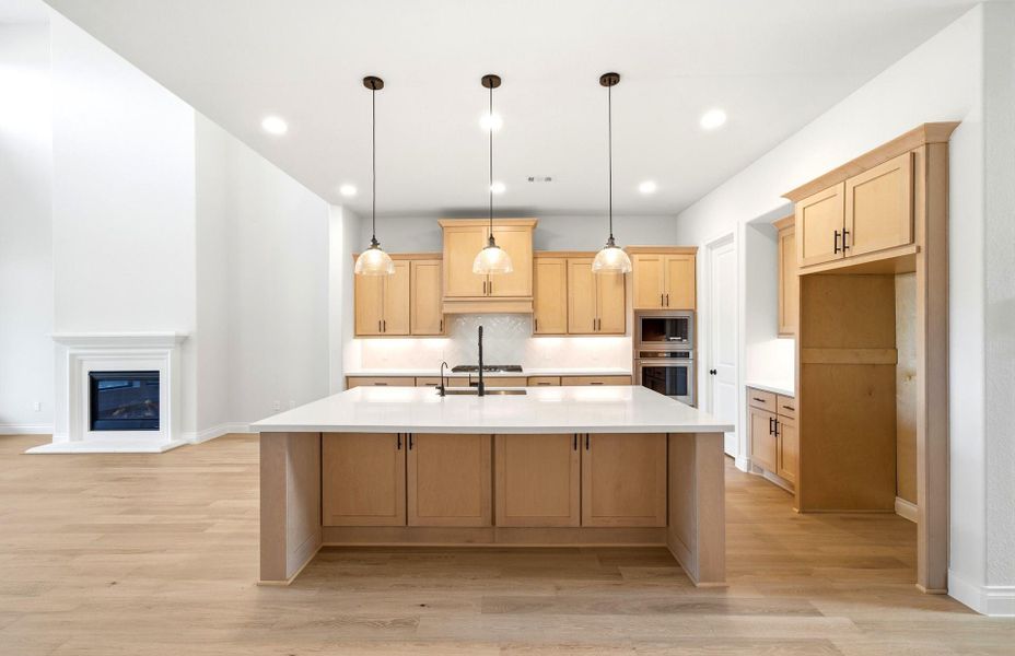 Furnished interior view inside a new home in Bridgeland 50', Cypress (Image 11).