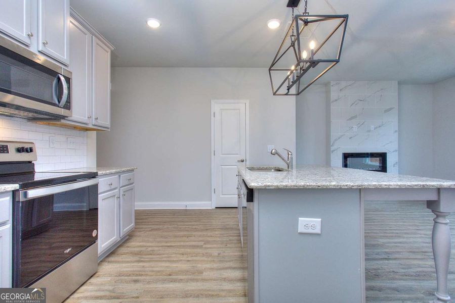 Furnished interior view inside a new home in Chimney Oaks Townhomes, Homer (Image 7).