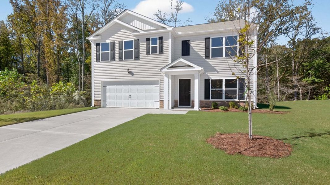 Front exterior of a new home in Olive Branch, Clayton, NC, highlighting curb appeal (Image 23).