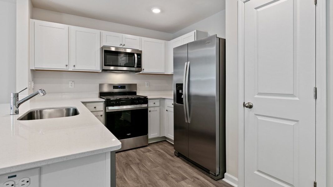Furnished interior view inside a new home in The Townes at Martin Farms, Aberdeen (Image 5).