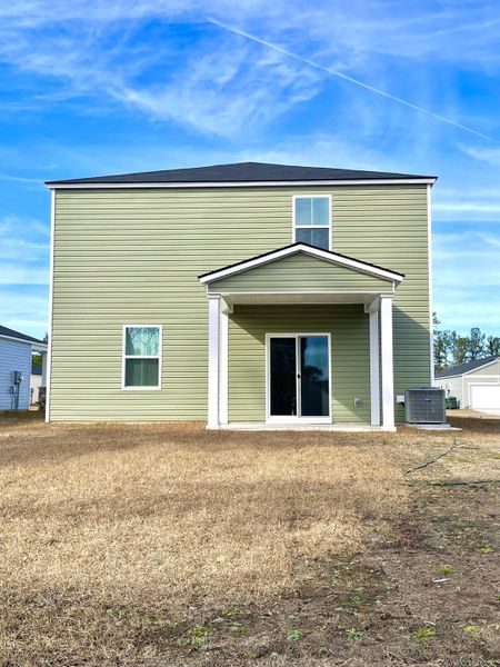 Exterior details and patio area of a home in Lindera Preserve at Cane Bay Plantation, Summerville (Image 18). Exterior details and patio area of a home in Lindera Preserve at Cane Bay Plantation, Summerville (Image 18).