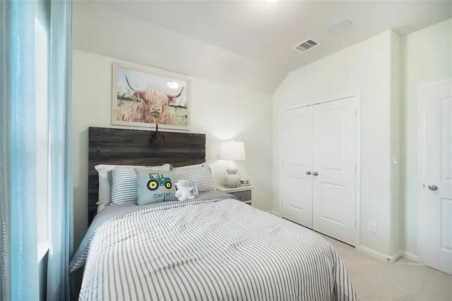 Furnished interior view inside a new home in Sunterra: Premier Collection, Katy (Image 3). Furnished interior view inside a new home in Sunterra: Premier Collection, Katy (Image 3).