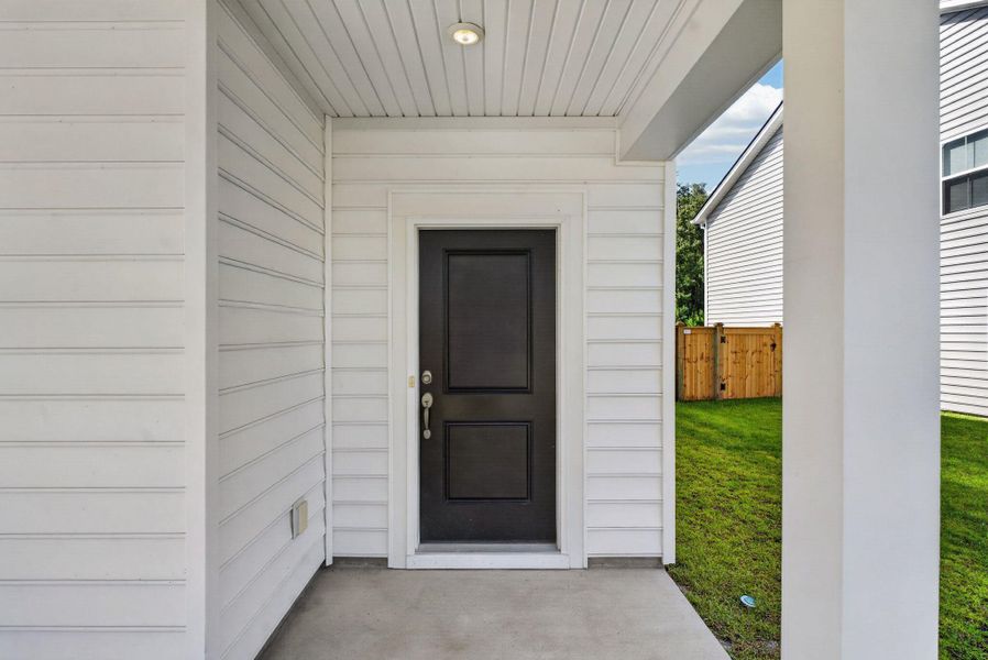 Exterior details and patio area of a home in Sweetgrass at Summers Corner, Summerville (Image 3).