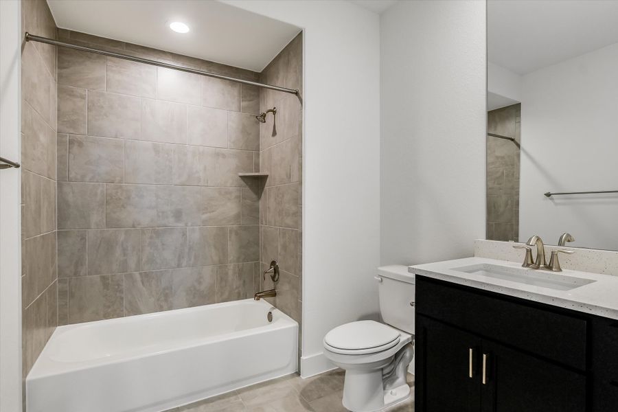 Furnished interior in a model home at Burnet Hilltop Estates in Cedar Park (Image 24).