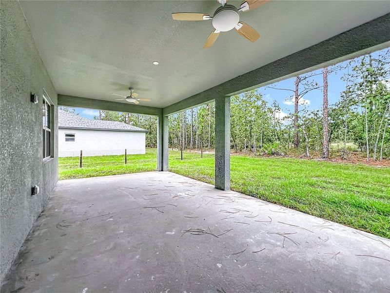 Exterior details and patio area of a home in , Brooksville (Image 3).