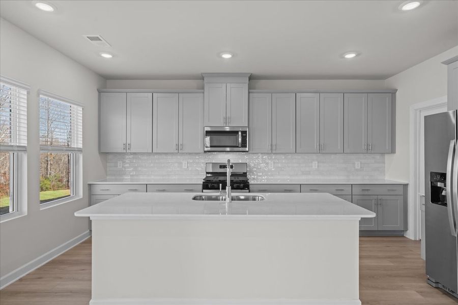 Furnished interior view inside a new home in The Farm at Wells Creek - Signature Collection, Gray Court (Image 3).