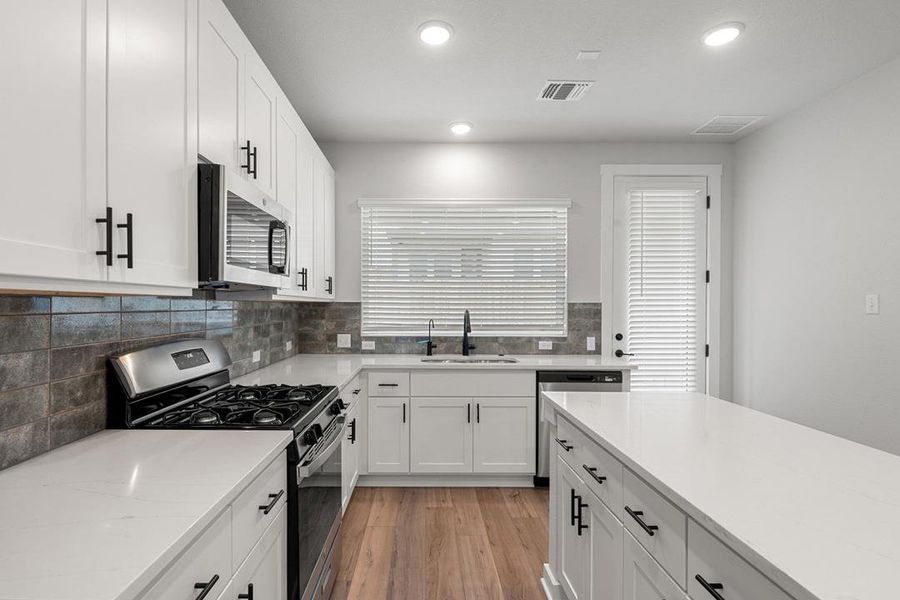 Furnished interior view inside a new home in Park Central, Georgetown (Image 8).