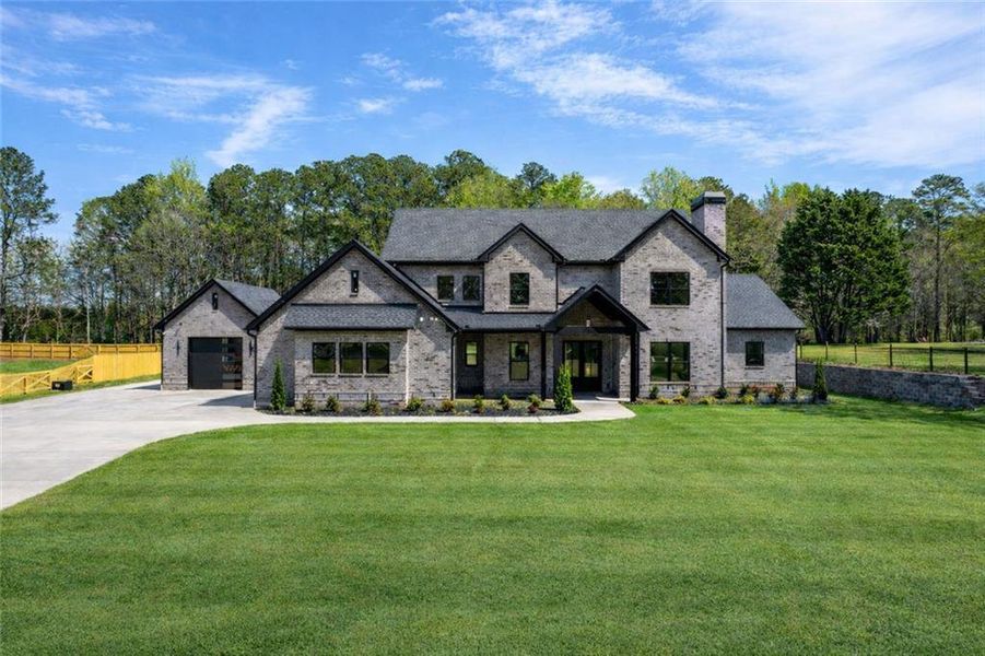 Front exterior of a new home in , Monroe, GA, highlighting curb appeal (Image 35). Front exterior of a new home in , Monroe, GA, highlighting curb appeal (Image 35).