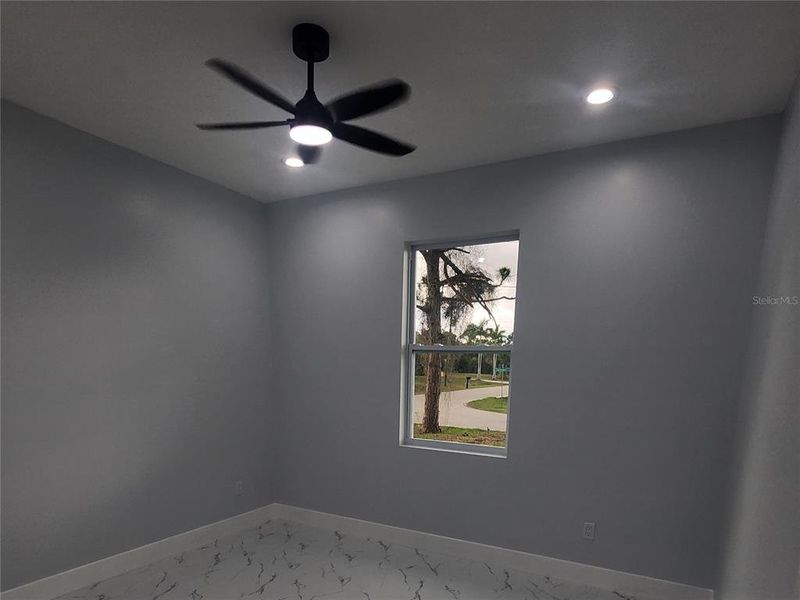 Spacious, unfurnished interior of a new home in , Port Charlotte (Image 28).