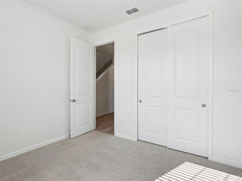 Spacious, unfurnished interior of a new home in Coasterra - Reserve Series, Palmetto (Image 17).