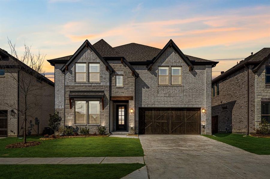 Front exterior of a new home in Willow Wood, McKinney, TX, highlighting curb appeal (Image 2).