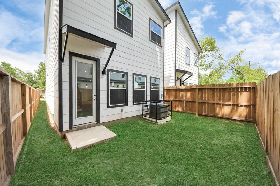 Exterior details and patio area of a home in , Houston (Image 3).