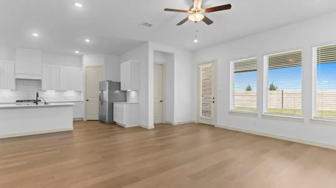 Representative unfurnished interior of a home built from the Lancaster by D.R. Horton in Alexander 65' Homesites, Pearland (Image 12).