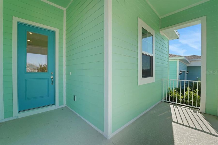 Exterior details and patio area of a home in Green Key Village, Lady Lake (Image 18).