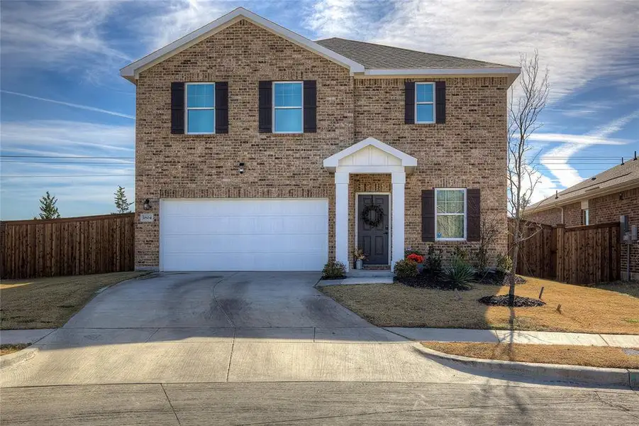 Front exterior of a new home in Gateway Parks, Heath, TX, highlighting curb appeal (Image 1). Front exterior of a new home in Gateway Parks, Heath, TX, highlighting curb appeal (Image 1).