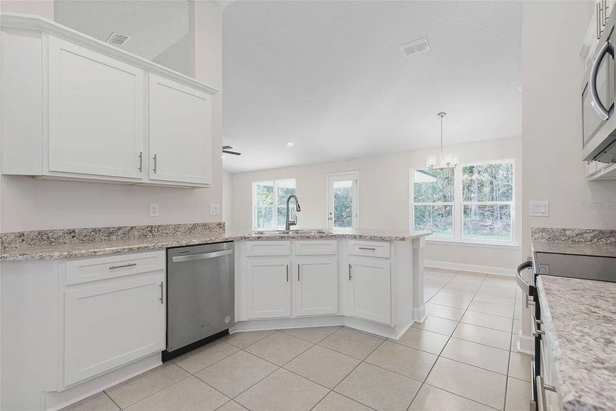 Furnished interior view inside a new home in Bayshore, Port St. Lucie (Image 4).