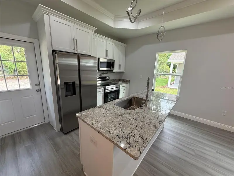 Furnished interior view inside a new home in , Gainesville (Image 4).