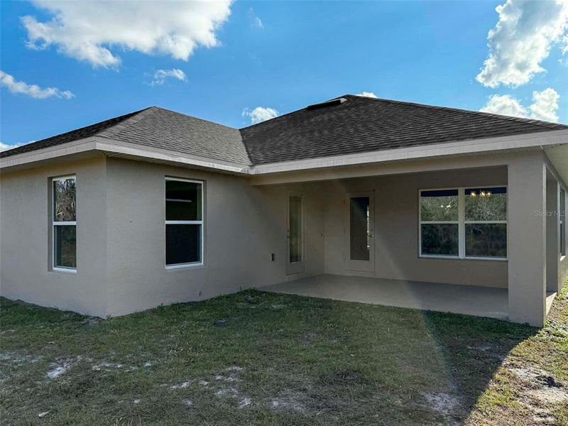 Exterior details and patio area of a home in Harmony Central, Harmony (Image 3).