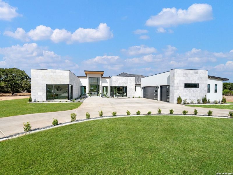 Front exterior of a new home in , Fair Oaks Ranch, TX, highlighting curb appeal (Image 22).