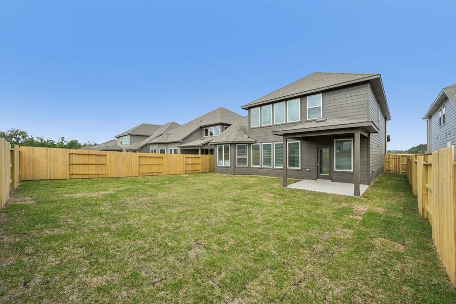 Exterior details and patio area of a home in Riviera Pines - Classic Series, Huffman (Image 2). Exterior details and patio area of a home in Riviera Pines - Classic Series, Huffman (Image 2).