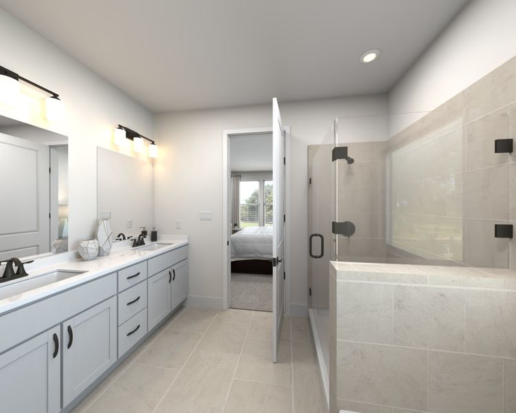 The primary bathroom offers dual vanity sinks and a walk-in shower.