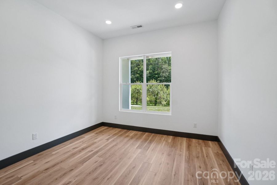 Spacious, unfurnished interior of a new home in , Hendersonville (Image 36).