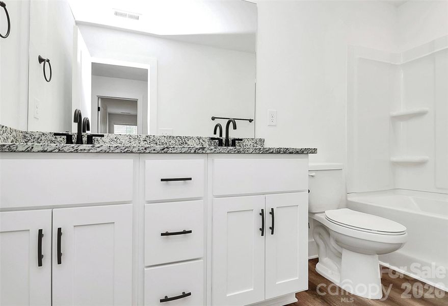 Furnished interior view inside a new home in , Monroe (Image 4).