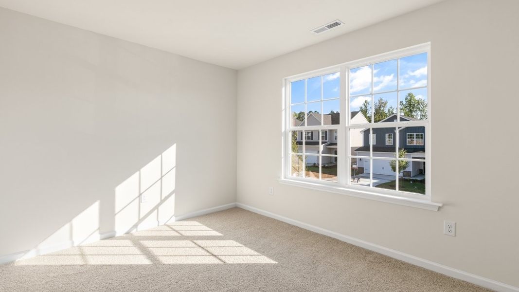 Spacious, unfurnished interior of a new home in The Grove at Matthews Landing, Fuquay Varina (Image 27).