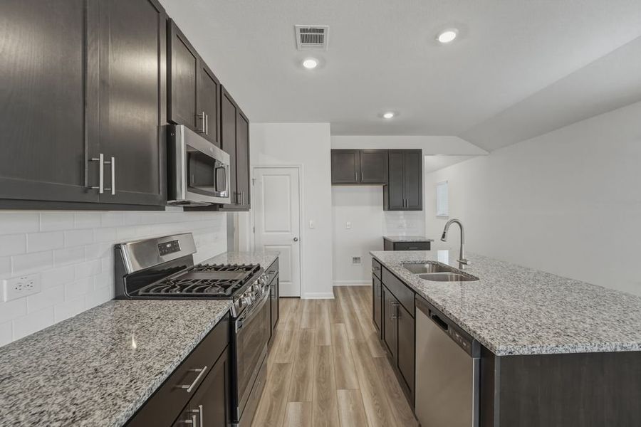 Furnished interior view inside a new home in Longview, Del Valle (Image 7).