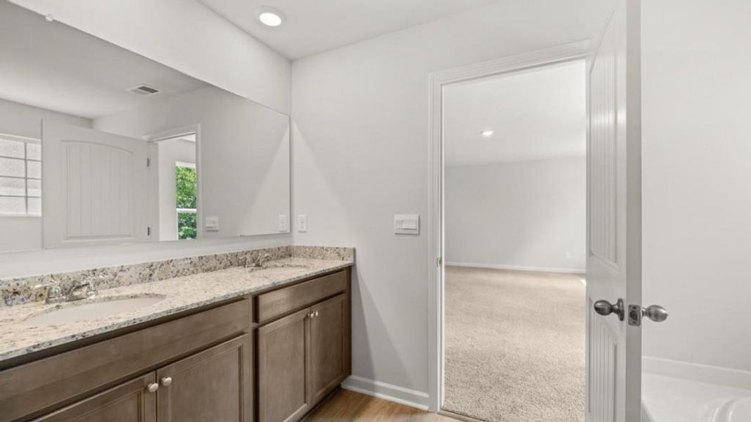 Furnished interior view inside a new home in Northwoods at Mirror Lake, Villa Rica (Image 12).