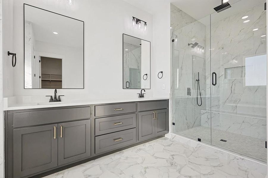 Bathroom with vanity and walk in shower