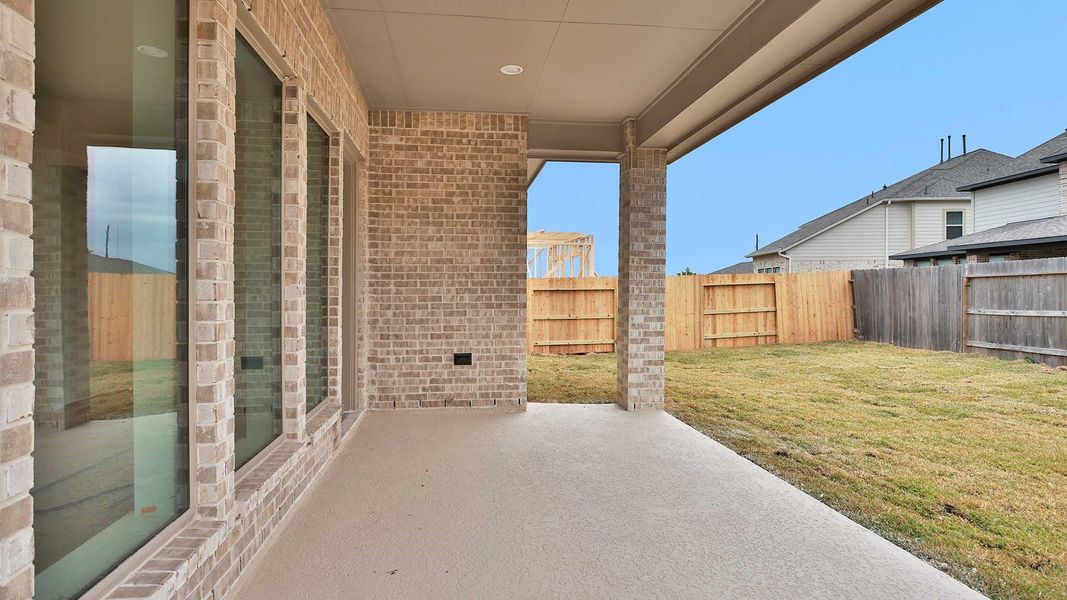Exterior details and patio area of a home in Marvida, Cypress (Image 3).