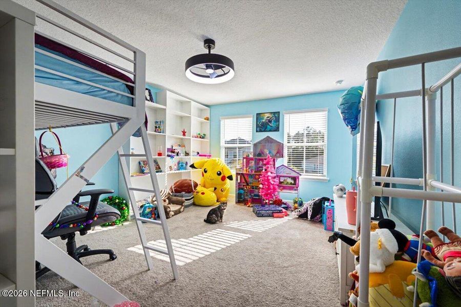 Furnished interior view inside a new home in RiverTown - Settlement, St. Johns (Image 35).