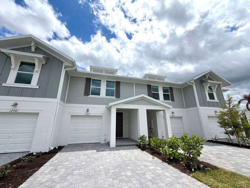 Front exterior of a new home in Meritage Homes at Central Park, Port St. Lucie, FL, highlighting curb appeal (Image 10).