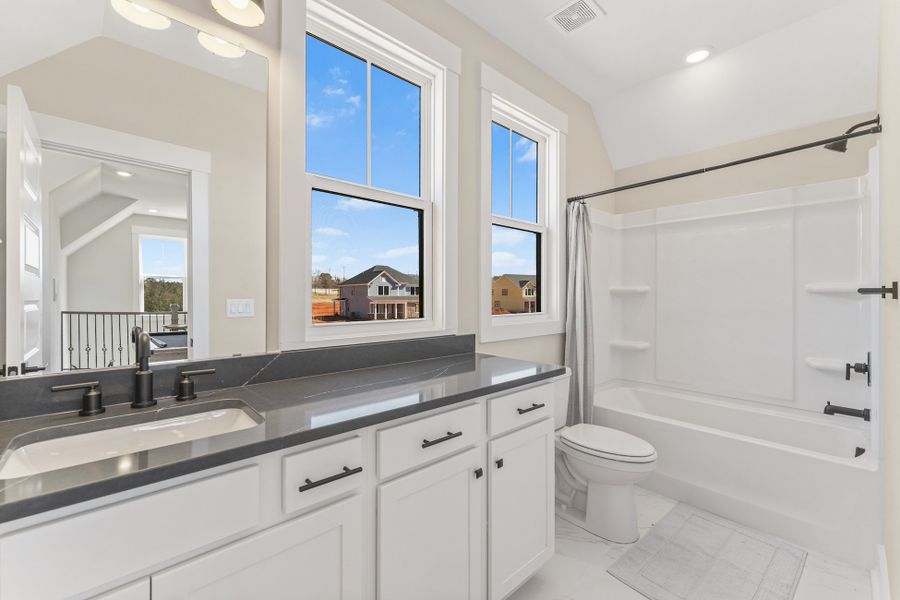 Representative furnished interior of a home built from the Emmy by Hunter Quinn Homes in Walker's Pointe, Anderson (Image 17).