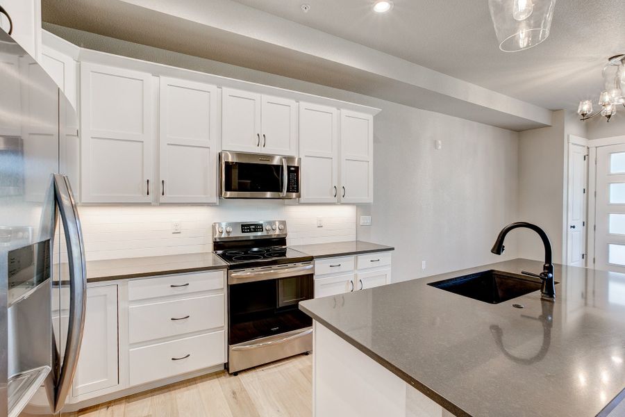 Representative furnished interior of a home built from the The Camden 2 by Landmark Homes in Highlands at Fox Hill, Longmont (Image 6).