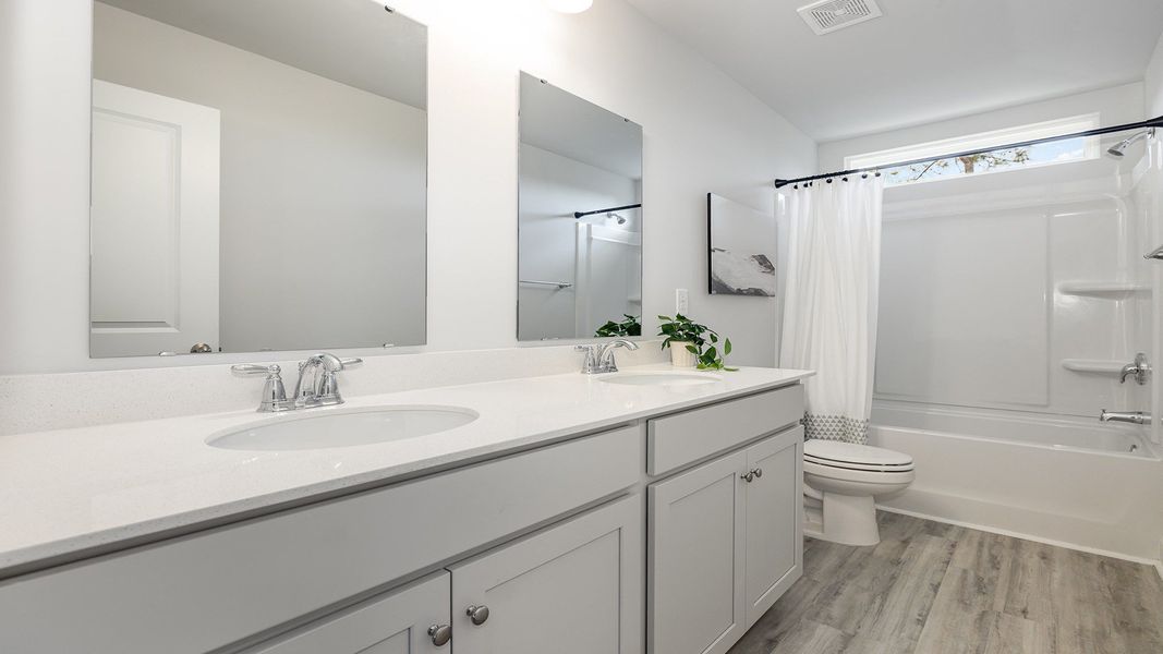 Furnished interior view inside a new home in Brunswick Plantation, Ash (Image 15).