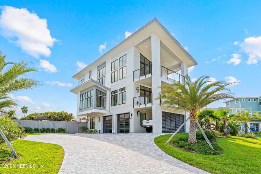 Front exterior of a new home in , Ponte Vedra Beach, FL, highlighting curb appeal (Image 23).
